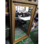 A large gold framed mirror: 168cm x 87cm