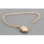 9ct gold hallmarked locket pendant & 9ct chain: gross weight 4.7g, chain 45cm.