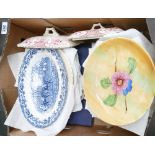 A mixed collection of items to include: decorative wall plates, tureen lids,
