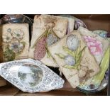 A mixed collection of items to include: decorative wall plates,