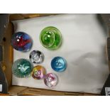A collection of glass paperweight to include: Caithness Diablo, Cauldron,