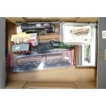 A mixed collection of items: to include boxed model trains, Hornby tinned plate similar items,