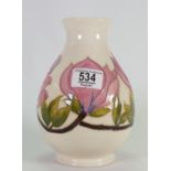 Moorcroft Vase: decorated in Magnolia Design, height 19.