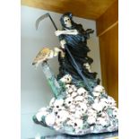 A large resin figure of the grim reaper: height 53cm