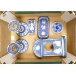 A collection of damaged Wedgwood Dip Blue items to include: Tempis Fugit mantle clock, candlesticks,