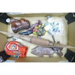 A collection of Ethnic theme wood and resin figures: to include boats, busts,