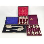 A collection of Silver Spoons: comprising two cased sets of spoons,