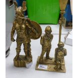 Decorative brass figure of Viking: policeman and child.