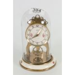 Small Brass in 8 day Clock in Plastic Dome: Aug.