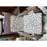 Carved Ethnic Theme Upholstered Smokers Chair: