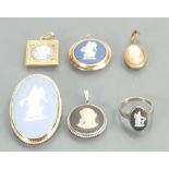 Six pieces of Wedgwood jewellery: both silver & gilt pieces. Ring, brooch & pendants.