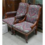 Edwardian carved walnut His and Hers open armchairs: upholstery in need of repair(2)