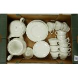 A collection of Royal Albert & Wedgwood White Glazed tea ware: