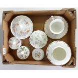 A collection of Wedgwood items to include: small box and covers, cups ,