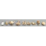A collection of 9ct gold charms: 13 grams.