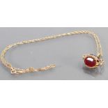 9ct gold spinning hardstone fob & 9ct chain: 4.