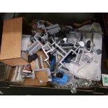 A quantity of metal fittings: bolts, curtain track accessories, plumbing fittings etc.