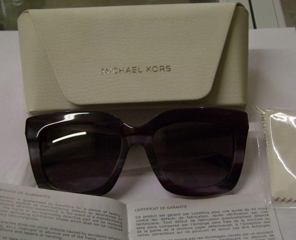 Five pairs of Michael Kors unisex sunglasses: cased.