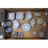 A collection of Wedgwood blue jasperware items: to include trinket boxes, bud vases etc (15).