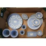 A collection of Wedgwood blue jasperware items: to include plates, pin dishes etc (22).