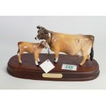 Beswick Jersey Cow and Calf: on wooden plinth