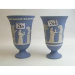 A pair of Wedgwood blue jasperware flared vases: 19cm in height.
