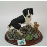 Border fine arts figure of a working spaniel: