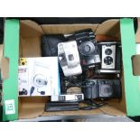 A collection of cameras to include: TDC-15 100k digital camera, Ricoh TF-900 automatic, Olympus