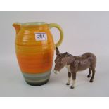 A ribbed Shelley jug (a/f): together with a Beswick donkey (2).