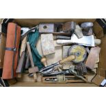A mixed collection of vintage wood working tools to include: Taylors Chisels, leather tape