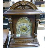 A large wooden mantle clock: Height 47cm