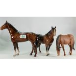 Beswick The Winner: model 2421, quater horse model 2186 and a Royal doulton grazing brown matt horse