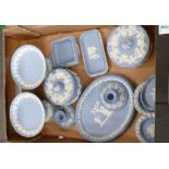 A collection of Wedgwood jasper ware items to include lidded boxes: pin trays, candlesticks etc