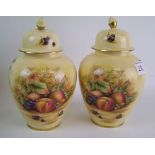 A pair of Aynsley Orchard Gold pattern jugs: (1 a/f) height 22cm.