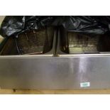 A commercial stainless steel deep fat fryer (used).