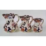 A set of three Masons Blue Mandalay graduated jugs : Height of tallest 16cm