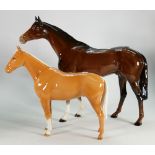 Beswick brown race horse: model 1564 together with palomino imperial horse (2)