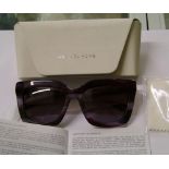 Four pairs of Michael Kors unisex sunglasses: cased.