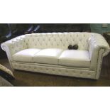 Three seater settee in white by pass leather: with diamante buttons