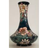 Moorcroft vase decorated in the Carousel design by Rachel Bishop dated 727: Height 29.5cm.