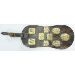 A collection of Leather mounted brass Railway & similar Horse brasses: 9 items mounted on leather