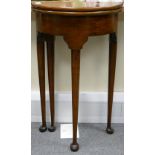 19th century Mahogany small oval folding Hall table: Sitting on tall pad feet,