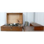 A complete watch repairers lathe: Plus collets, tools and motor with stand. Cased.