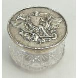 Large silver topped cut glass cosmetic jar: Hinged embossed lid of high quality. Measures 8.