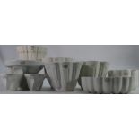 A collection of Shelley Jelly Moulds to include: Round Ornamental, Victoria, Queens,