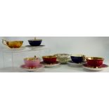 A collection of 7 Aynsley Paragon floral decorated tea cup sets: