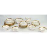 Aynsley gilded tea set: 21 piece set with additional saucers (wear noted to surfaces).
