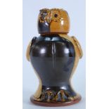 Carole Glover Stoneware jar & cover in the form of an owl: Staffordshire Slipware style,