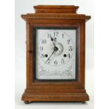 Early 20th century John Bull Automatic Alarm Mantle clock: In oak case, h35 x w23cm.