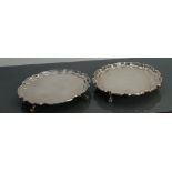 Two silver waiters or small salvers: B'ham 1976 & London 1901, both 15.5cm wide. Gross weight 328.